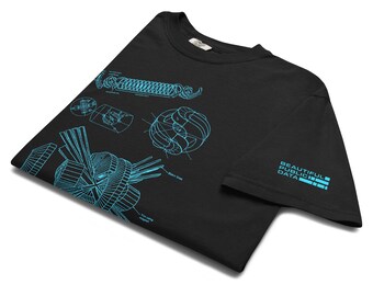 May include: A black short-sleeved t-shirt featuring bright cyan blue technical line drawings of mechanical components and diagrams. The sleeve displays the text "BEAUTIFUL PUBLIC DATA" in a bold, cyan blue, blocky, sans-serif font.