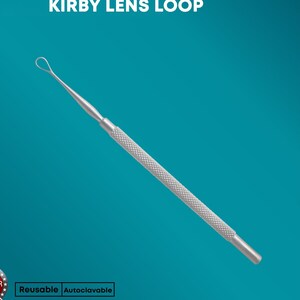 May include: A silver Kirby Lens Loop tool with a textured handle and a looped end. The text "KIRBY LENS LOOP" is at the top. The tool is labeled as reusable and autoclavable. The background is teal.