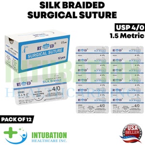 May include: A pack of 12 silk braided surgical sutures, USP 4/0, 1.5 Metric. The packaging includes a box and individual sterile packets. The box is white and blue with the text "RT ED SURGICAL SUTURE".