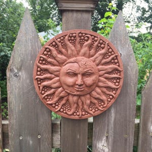 Sun and Moon  Concrete Garden Plaque Partial Eclipse in Terra Cotta