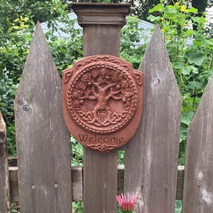Tree of Life Welcome Plaque Garden Art in Concrete In Terra Cotta (Red)