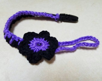 Crochet purple flower pacifier or teething toy holder