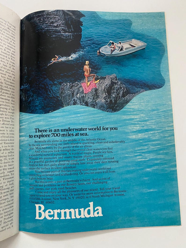 May include: A colorful travel advertisement for Bermuda, featuring a woman in a red swimsuit on a rocky outcrop, a boat with people in it, and clear blue water. The text reads "There is an underwater world for you to explore 700 miles at sea. Bermuda."