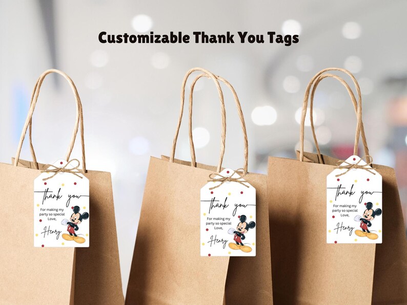 May include: Three brown paper gift bags with white thank you tags featuring a cartoon Mickey Mouse character. The tags say "Thank you for making my party so special, Love, Henry".