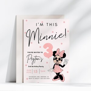 May include: A pink and white birthday invitation with a cartoon image of Minnie Mouse holding a pink balloon with the number 3 on it. The text on the invitation reads "I'm this Minnie!" and "You're invited to Peyton's 3rd Birthday Party".