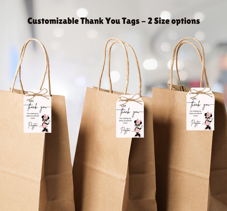 May include: Three brown paper gift bags with white thank you tags attached. The tags feature a cartoon image of Minnie Mouse and the text "OH Thank you for making my party so special Love, Peyton".