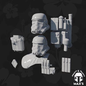May include: A white plastic model kit of a Star Wars Stormtrooper helmet and armor. The kit includes a helmet, chest plate, shoulder pads, and other accessories.