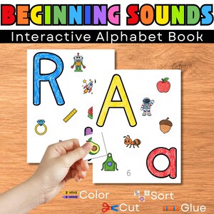 May include: An interactive alphabet book titled Beginning Sounds featuring pages with large letters R and A, accompanied by colorful illustrations of objects like a robot, rocket, ring, apple, astronaut, acorn, ant, apron, and avocado.