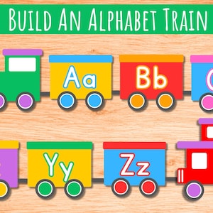 May include: A colorful educational toy set featuring train cars with letters of the alphabet. The top green banner displays the text BUILD AN ALPHABET TRAIN. Each train car is a different color and features uppercase and lowercase letters.