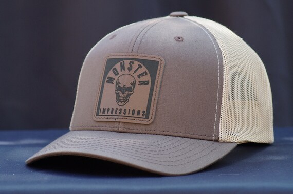 The Monsters Tan Hat with Patch Primary Icon Tan Flex Hat | Center Ice, the official  main image 2