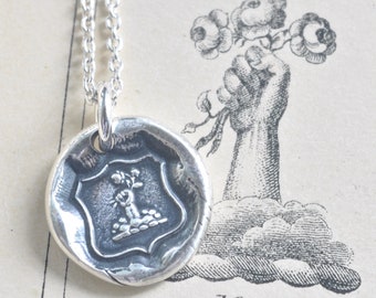 flower wax seal necklace - hope and joy - fist and flowers - family crest wax seal jewelry