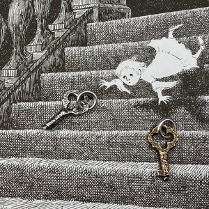 May include: Two antique skeleton keys, one gold and one silver, are placed on a black and white illustration of a staircase with a figure falling down the steps.