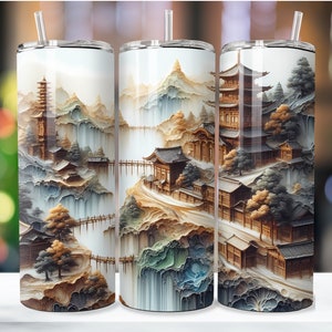 Op de afbeelding: Drie roestvrijstalen bekers met een kleurrijke illustratie van een Japans berglandschap met watervallen, pagodes en bomen. De bekers staan op een wit oppervlak.