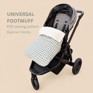 May include: A black pushchair with a grey seat and a universal footmuff featuring a white textured top section and a green and white gingham patterned lower section. Text on the image reads UNIVERSAL FOOTMUFF PDF sewing pattern Beginner friendly.