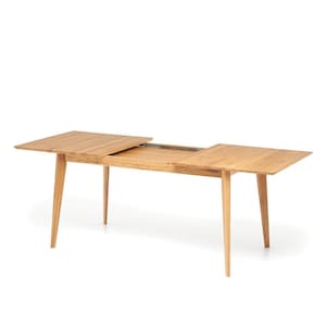 May include: A light-colored wooden dining table with a rectangular top and four angled legs. The table has an extendable leaf, offering additional surface area. The table is set against a white background.
