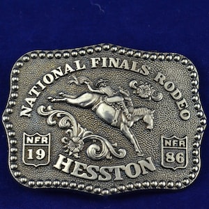 Hesston 1986 NFR Rodeo Miniature Child&#39;s/Ladies Belt Buckle - National Finals Rodeo – Bronc Riding - Fourth Edition Collectors Buckle