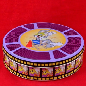 Lata de película antigua del director Bugs Bunny - Warner Brothers - Looney Tunes - Cartoon Charter - Lata de caramelos - Tira de película Tweety Bird