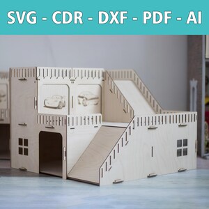 May include: A wooden toy garage with ramps, stairs, and car illustrations. The structure is made of light-colored wood and features cut-out windows and a garage door. Text at the top reads: SVG - CDR - DXF - PDF - AI.