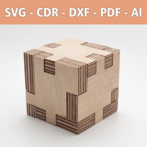 May include: A wooden cube with a complex interlocking design. The cube is made of light wood with dark wood accents. The design is intricate and geometric.