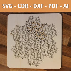 May include: A laser-cut wooden puzzle featuring a complex geometric design resembling a snowflake. The puzzle is made of light brown wood and has a intricate pattern of black lines.