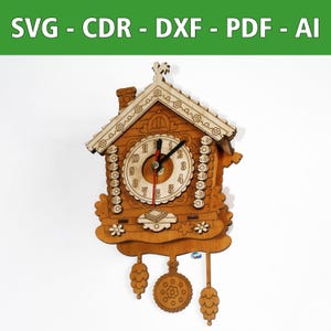 May include: A wooden cuckoo clock with a detailed design. The clock features a house-shaped frame, a round clock face with Roman numerals, and decorative elements. The clock hands are black, and the second hand is red. The top of the clock has the text "SVG - CDR - DXF - PDF - AI".