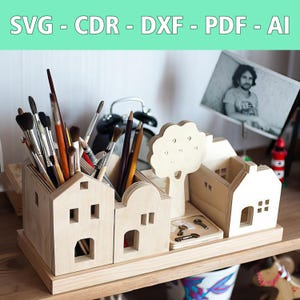 Laser file desk organizer in modern design - SVG, CDR and more - with three charming houses and a tree - Perfect for hobbyists