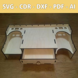 May include: A wooden organizer with two compartments, a drawer, and a top shelf. The organizer is made of light wood and has a natural finish.