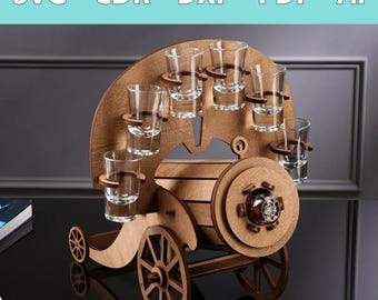 May include: Wooden shot glass holder shaped like a cannon with wheels. The cannon has a barrel with a wooden texture and a metal-looking detail on the front. The holder has six shot glasses attached to it.