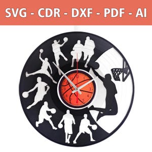 May include: A basketball-themed wall clock in black and white. The clock has a basketball court design with player silhouettes and a basketball-shaped clock face. The text "SVG - CDR - DXF - PDF - AI" is at the top.