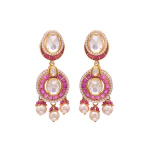May include: Gold earrings with pink and white stones and pearl accents.