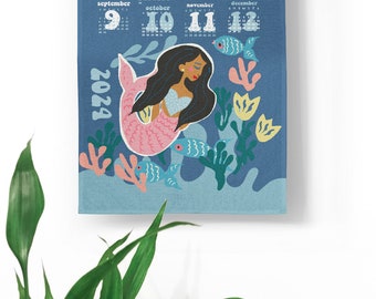 2024 Calendar Tea Towel in Mermaid. Made of a blend Linen and Cotton in Canada