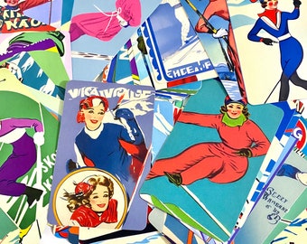 May include: A collection of vintage ski-themed postcards featuring illustrations of skiers in colorful clothing. The postcards have a variety of designs and colors, including blue, red, green, and white. Some of the postcards feature text, such as "Vicavielle" and "S.Lery Amiane & Co."