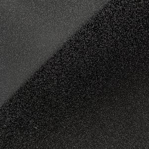 May include: A close-up of a black textured surface with a subtle sheen. The surface has a fine, grainy texture.