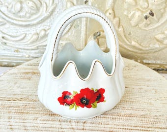 Cesta de porcelana vintage com estampa de papoula, fabricada pela Baum Brothers.