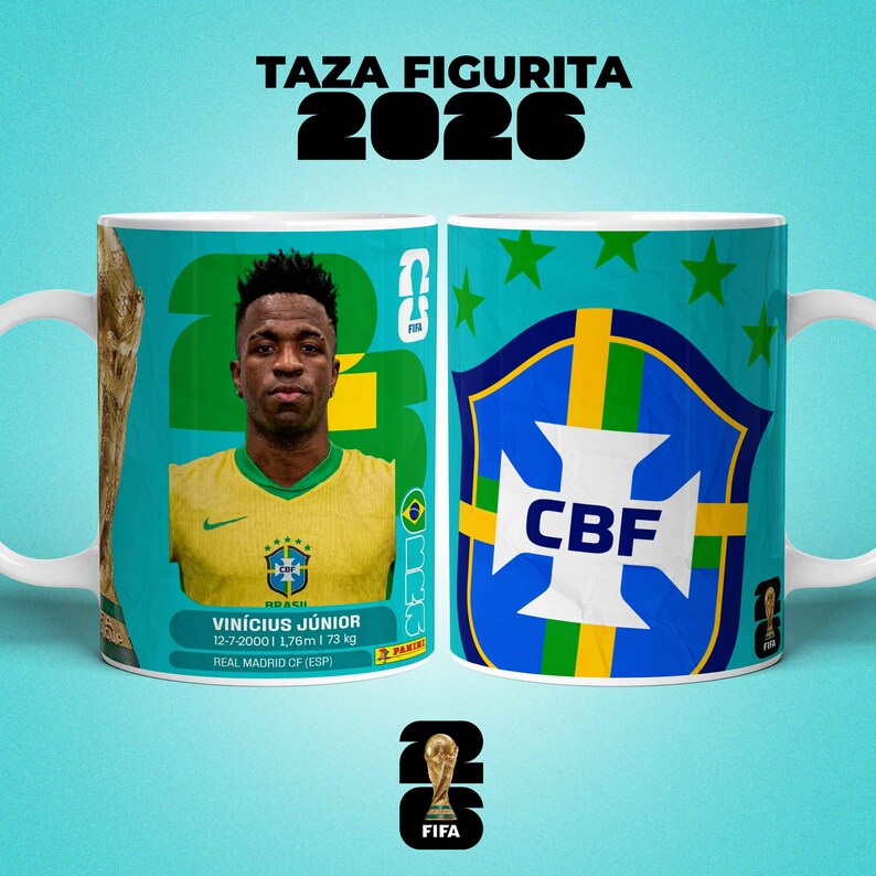 May include: A white ceramic mug with a portrait of Vin&iacute;cius J&uacute;nior in a yellow jersey, and the text "TAZA FIGURITA 2026". The mug also displays the CBF logo and FIFA branding.