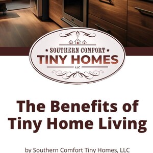 May include: A modern kitchen interior with wood cabinets, stainless steel appliances, and a farmhouse sink. The kitchen is part of a tiny home with a large window overlooking a wooded area. The text "★ SOUTHERN COMFORT ★ TINY HOMES LLC" is displayed on a sign.