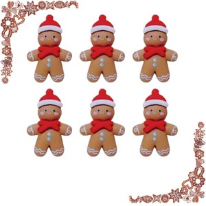 May include: Six gingerbread men ornaments with red hats and white icing details. The gingerbread men are all smiling and have red bows around their necks.