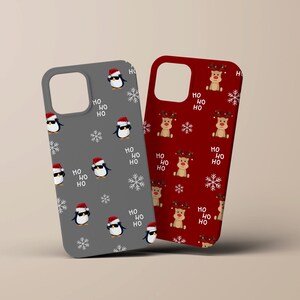 May include: Two phone cases with a Christmas theme. One case is gray with a penguin pattern and the text "HO HO HO". The other case is red with a reindeer pattern and the text "HO HO HO".