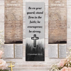 May include: Three vertical rectangular bookmarks featuring a wood grain background. The left and right bookmarks list Old and New Testament books above open Bible pages. The center bookmark displays the text Be on your guard; stand firm in the faith; be courageous; be strong. I Corinithian 16:13 with a black cross icon over a forest silhouette.