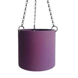 May include: A purple hanging planter with a black chain.