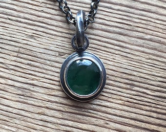 Dainty dark green jade pendant necklace. Oxydized silver pendant with natural jade cabochon on a chain