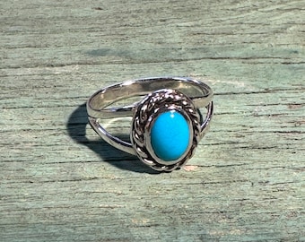 Little ornate sterling silver ring with bezel set sleeping beauty turquoise oval cabochon size 6 ready to ship