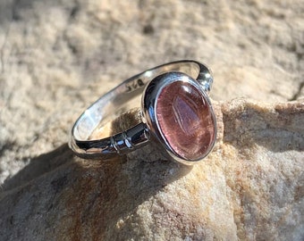 Simple pink tourmaline cabochon ring. Simple sterling silver ring with bezel set pink tourmaline oval cabochon size 7 1/2 ready to ship