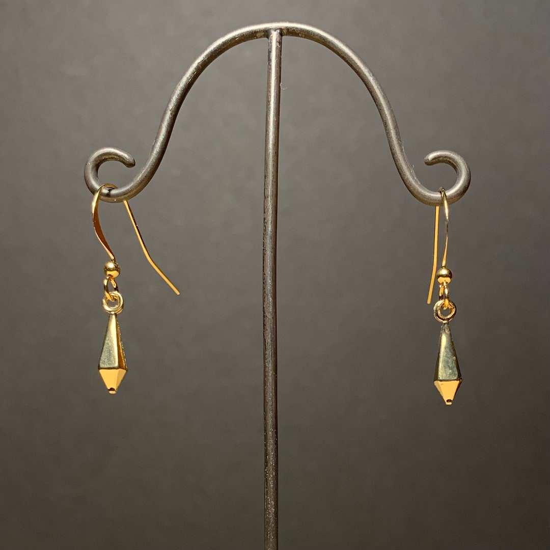 Boucle d'oreille vintage 1970 plaquée or unique à collectionner