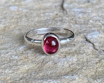 Simple pink tourmaline cabochon ring. Simple sterling silver ring with bezel set pink tourmaline oval cabochon size 9 1/4 ready to ship