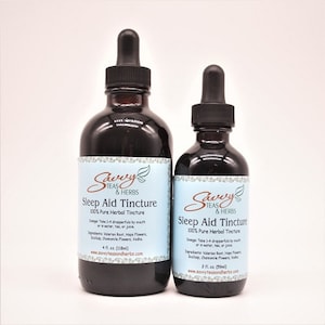 May include: Two amber glass bottles with dropper tops, labeled "Savery Teas & Herbs Sleep Aid Tincture 100% Pure Herbal Tincture". The larger bottle is 4 fl oz (118 ml) and the smaller bottle is 2 fl oz (59 ml).