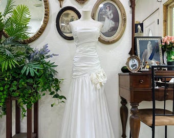 Elegant Strapless Mermaid Wedding Dress with Crystal Rosette Detail