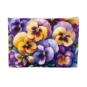 May include: A purple and yellow floral print zippered pouch with a close-up of pansies.