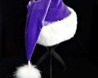 Gorro de Papá Noel de terciopelo violeta: Disfraz navideño para adulto, con ribete de piel sintética.