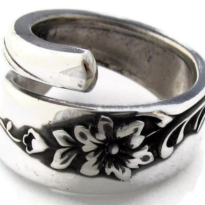 Ce moment magique... Si différent et si nouveau... Bague à cuillère enveloppée « The Drifters »